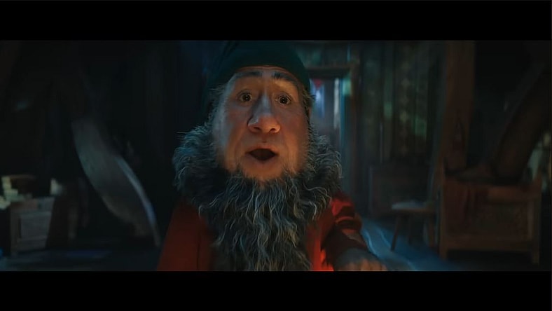 Doc The lead dwarf (voiced by Jeremy Swift) surprised to see Snow White (Rachel Zegler) in bed in Disney's Snow White, 2025, Walt Disney Pictures