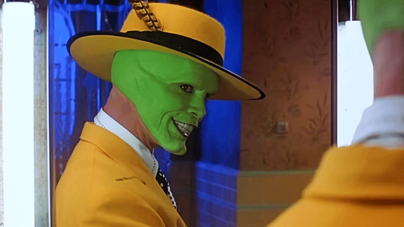 Ipkiss is all dressed up and ready to party because he's gotta in The Mask (1994), New Line Cinema