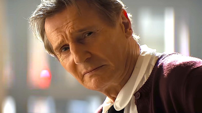 Frank Drebin Jr. (Liam Neeson) saves a group of hostages in The Naked Gun (2025), Paramount Pictures