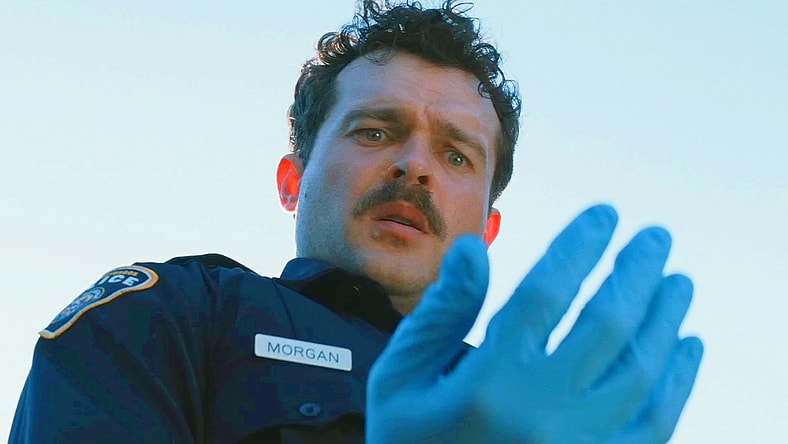 Paul (Alden Ehrenreich) makes a horrifying discovery in Weapons (2025), New Line Cinema