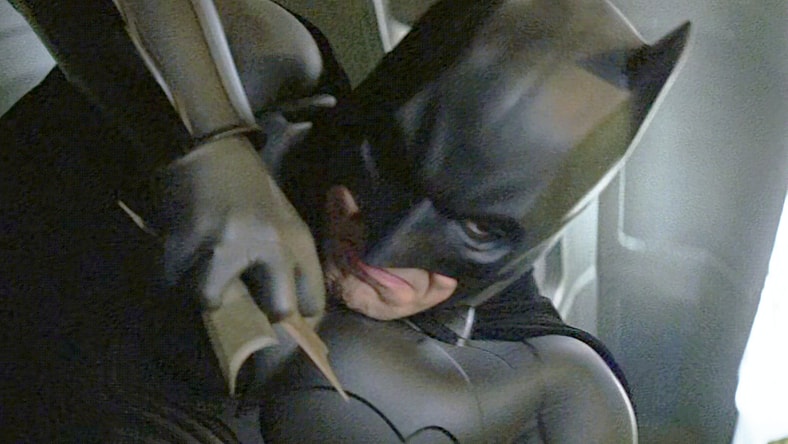 Batman (Christian Bale) gains the upper hand on Ra's al Ghul (Liam Neeson) in Batman Begins (2005), Warner Bros. Pictures