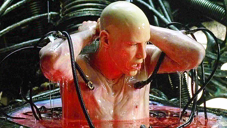 Neo (Keanu Reeves) awakens into the machine-controlled reality in The Matrix (1999), Warner Bros. Pictures