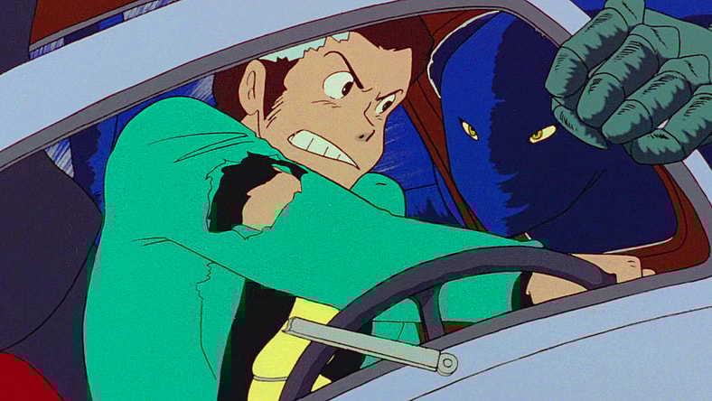 Lupin (Yasuo Yamada) attempts to ditch an unwanted hitchhiker in Lupin III: The Castle of Cagliostro (1979), Toho
