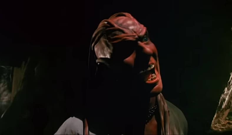 Peloquin (Oliver Parker) is dying for a bite of human meat in Nightbreed (1990),  20th Century Fox