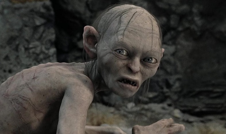 Gollum (Andy Serkis) schemes against Sam (Sean Astin) and Frodo (Elijah Wood) in The Lord of the Rings: The Two Towers (2002), New Line Cinema