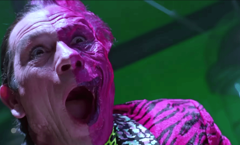 Two-Face (Tommy Lee Jones) heard something dirty in Batman Forever (1995), Warner Bros. Pictures