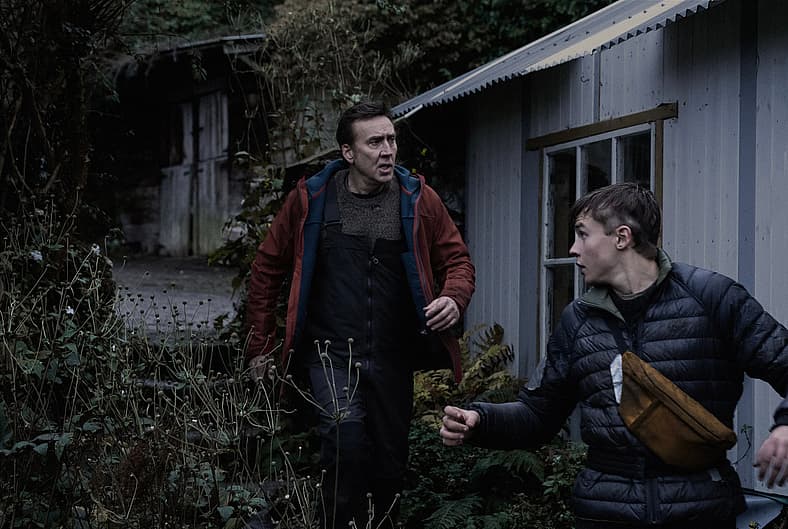 Nicolas Cage and Maxwell Jenkins as Paul and Thomas in Arcadian action horror film