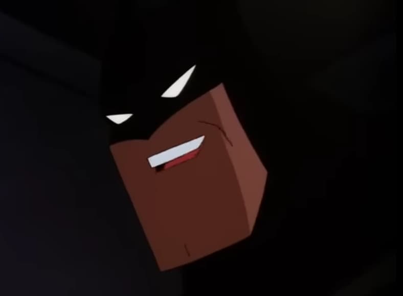 He's smiling