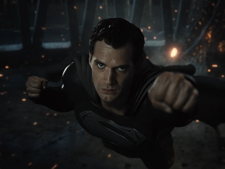 An angry Superman (Henry Cavill) flies towards Steppenwolf (Ciarán Hinds) in Zack Snyder's Justice League (2021), Warner Bros. Pictures