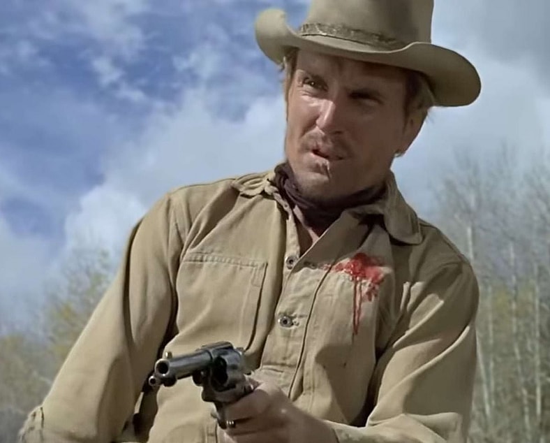 A perforated Ned Pepper (Duvall) has half a second to live in True Grit (1969), Paramount Pictures