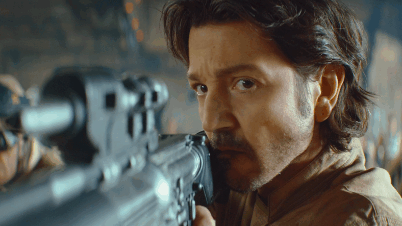 Cassian Andor (Diego Luna) demands that K2 (Alan Tudyk) be returned to him in Andor Season 2 Episode 9 "Welcome to the Rebellion" (2025), Lucasfilm
