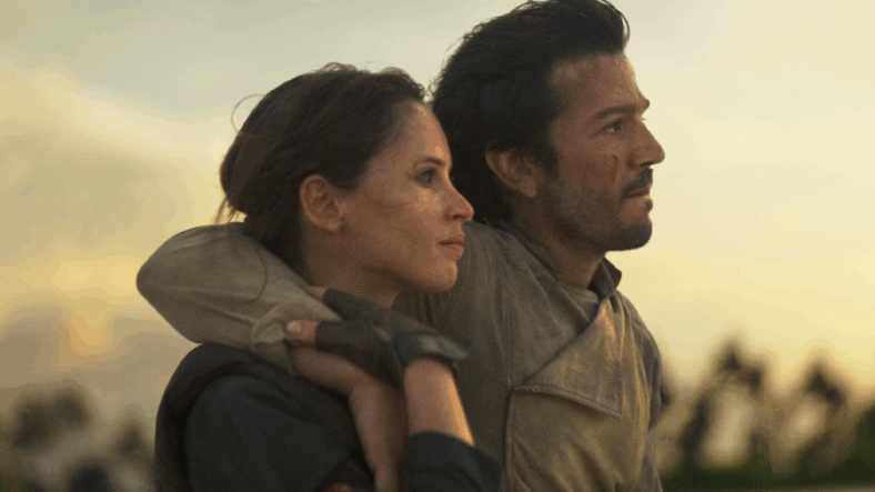 Jyn Erso(Felicity Jones) and Cassian Andor (Diego Luna) complete their mission in Rogue One: A Star Wars Story (2016), Lucasfilm