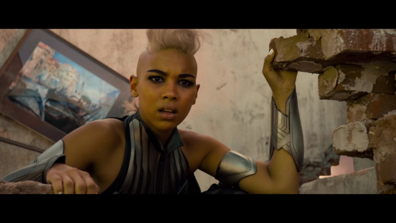 Storm (Alexandra Shipp) realizes the true extent of Apocalypse's (Oscar Isaac) brutality in X-Men: Apocalypse (2016), Marvel Entertainment