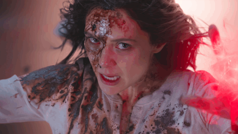 The Scarlet Witch (Elizabeth Olsen) tears through The Illuminati in Doctor Strange in the Multiverse of Madness (2022), Marvel Entertainment