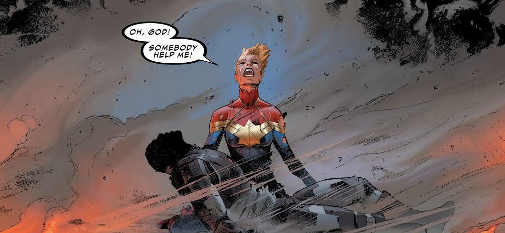 Captain Marvel with dead War Machine