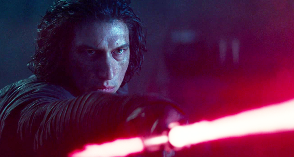 Kylo Ren (Adam Driver) draws his light saber in Star Wars Episode IX - The Rise of Skywalker (2019), Lucasfilm