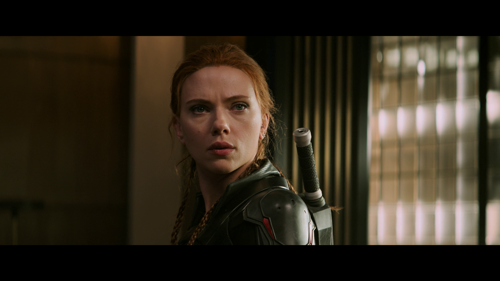 Black Widow (Scarlett Johansson) learns of the Rd Room's true reach in (Black Widow (2021), Marvel Entertainment via Blu-ray