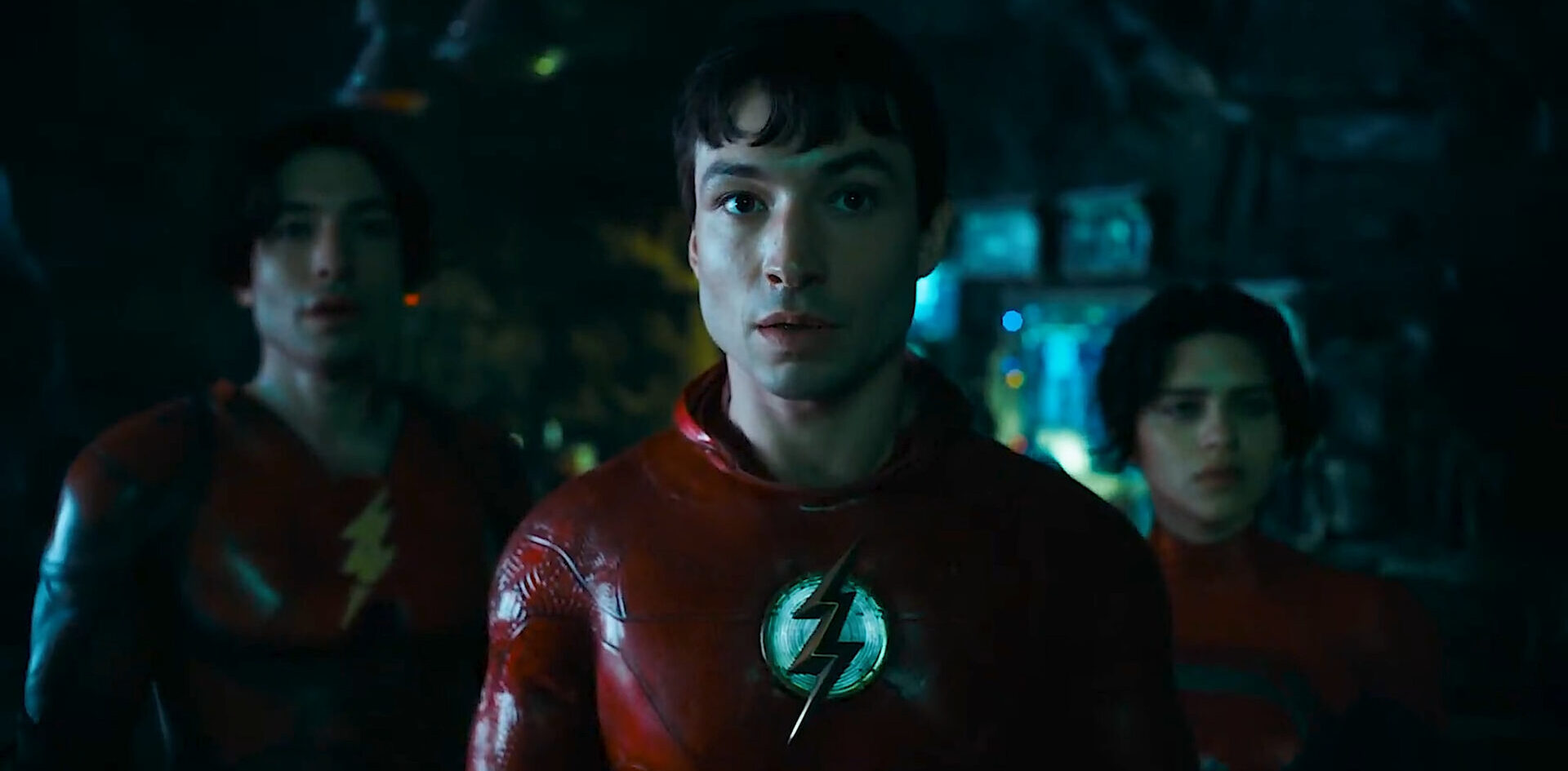 The Flash (Ezra Miller), another Flash (Ezra Miller), and Supergirl (Sasha Calle) in The Flash (2023), Warner Bros. Pictures
