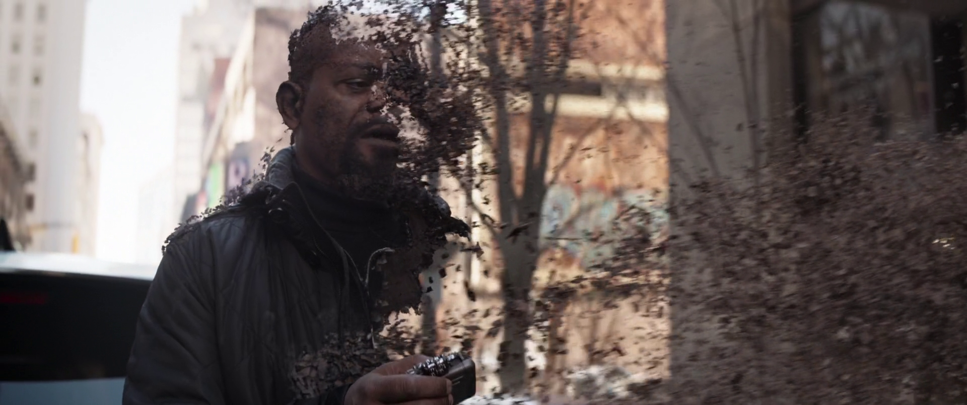Nick Fury (Samuel L. Jackson) suffers the effects of 'The Snap' in Avengers: Infinity War (2018), Marvel Entertainment