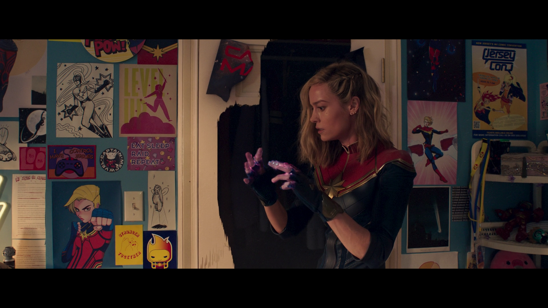 Captain Marvel (Brie Larson) swaps places with Ms. Marvel (Iman Vellani) in the post-credits scene to Ms. Marvel Season 1 Episode 6 "No Normal" (2022), Marvel Entertainment