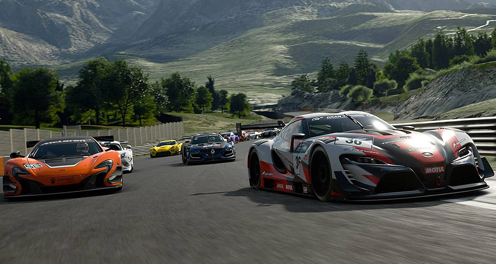 Supercars racing around the track in Gran Turismo 7