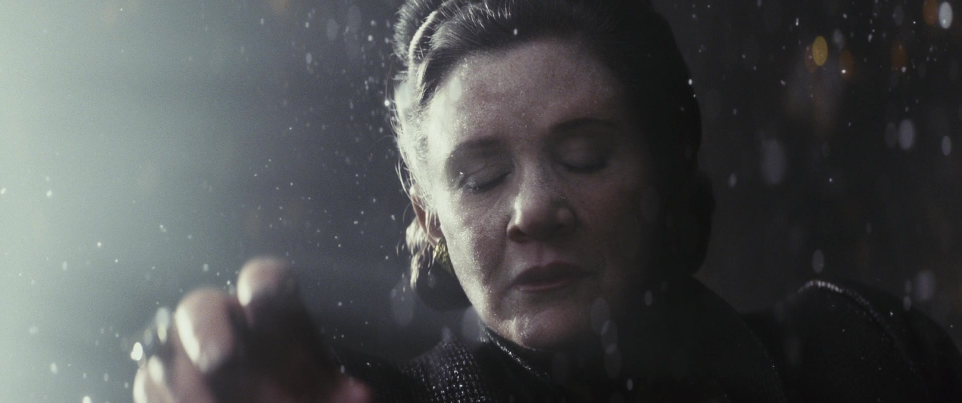 General Leia Organa Solo (Carrie Fisher) uses the Force to pull herself to safety from the vacuum in Star Wars: Episode VII - The Last Jedi (2017), Disney
