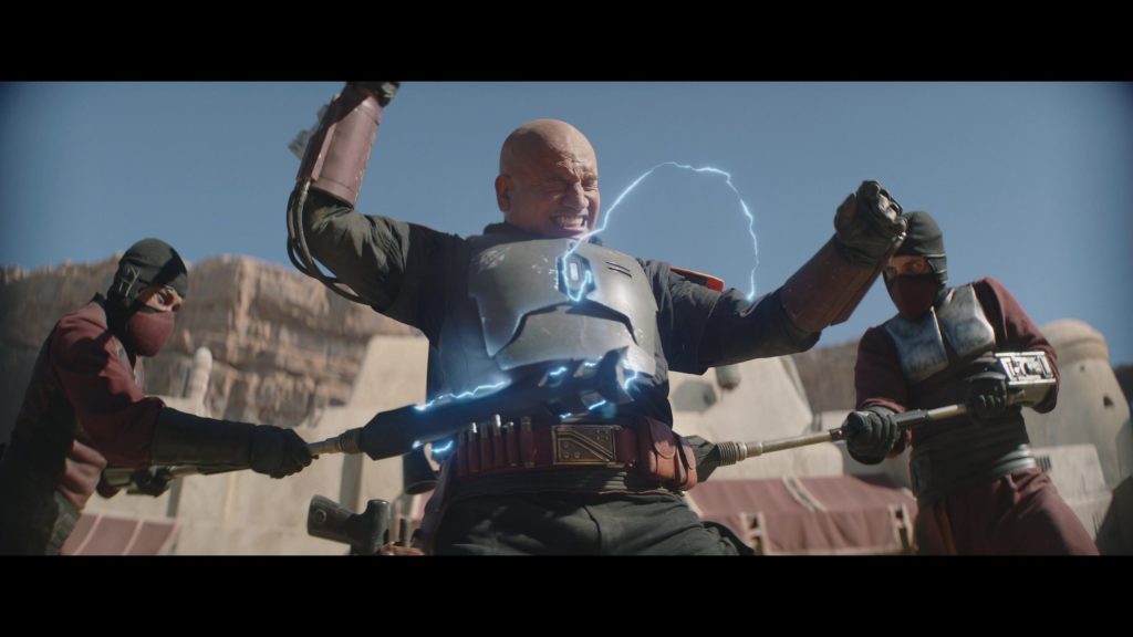 Boba Fett (Temuera Morrison) is hit with vibrosticks in The Book of Boba Fett Chapter 2 (2022), Disney Plus