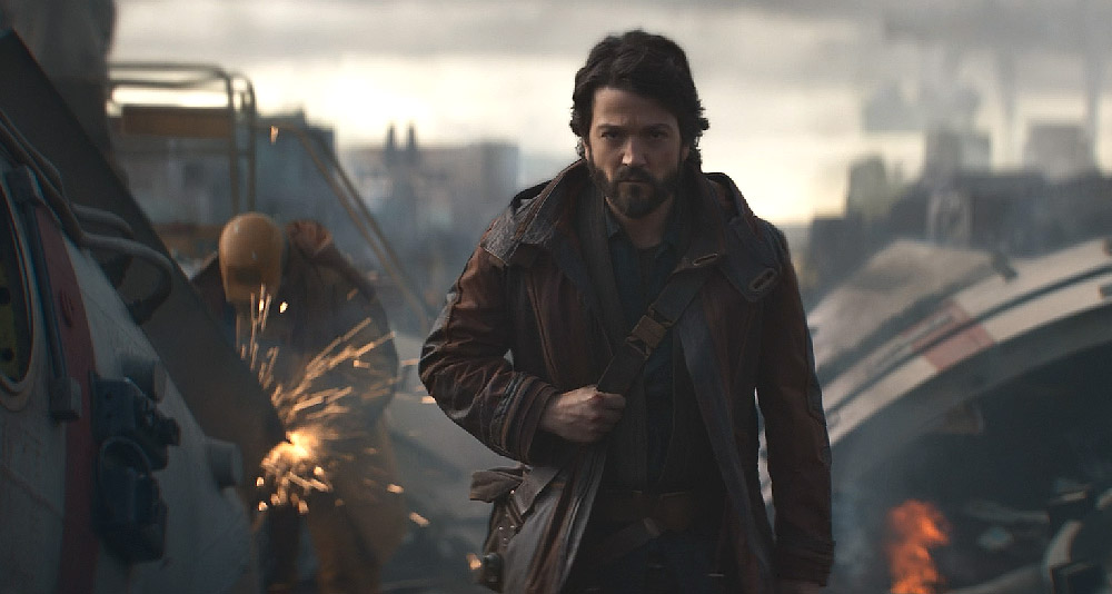 Cassian Andor walking through a scrapyard in Star Wars: Andor, Disney+