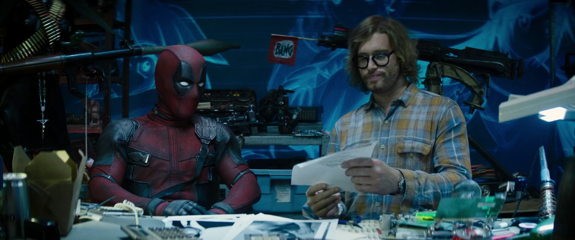 Deadpool (Ryan Reynolds) and Weasel (T.J. Miller) screen potential X-Force recruits in Deadpool 2 (2018), Marvel Entertainment