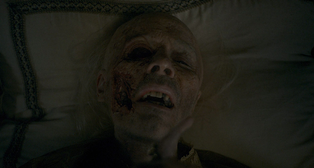 King Viserys dying in his bed in House of the Dragon, HBO