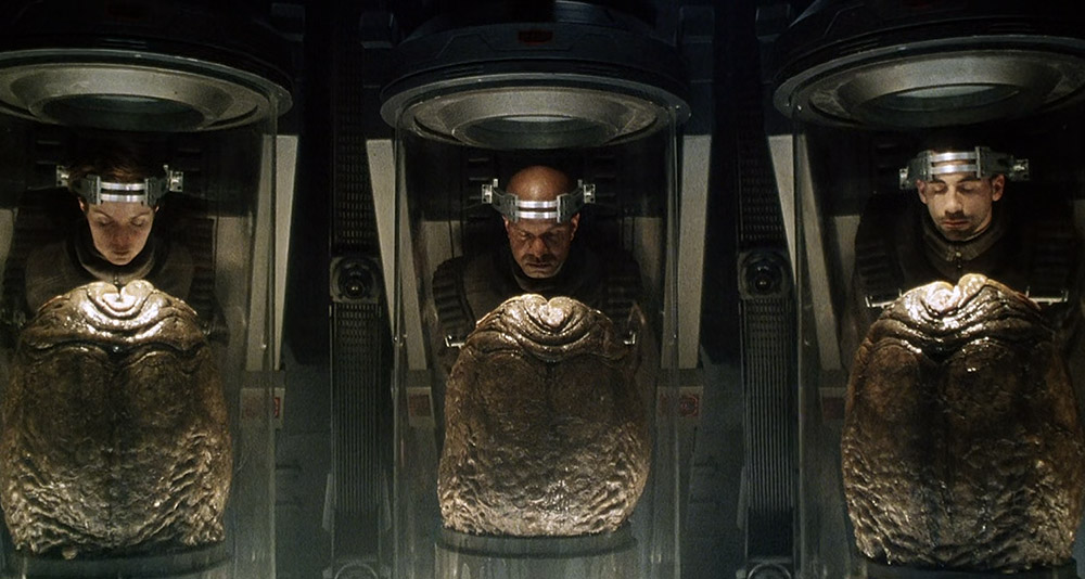 A civilian and a xenomorph egg in Alien Resurrection, 20th Century Fox