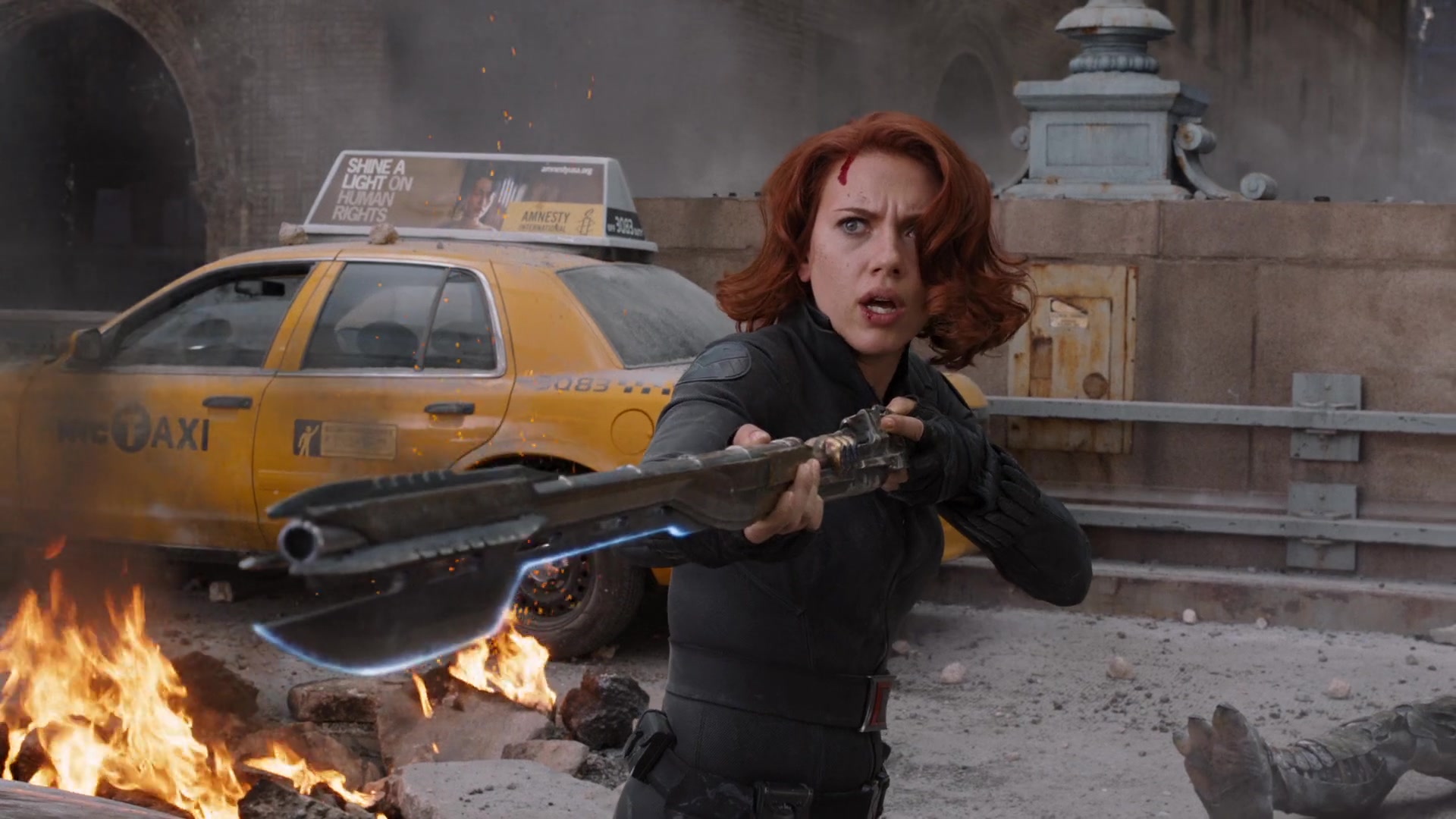 Black Widow (Scarlett Johansson) wields Loki's Scepter in The Avengers (2012), Marvel Entertainment via Blu-ray