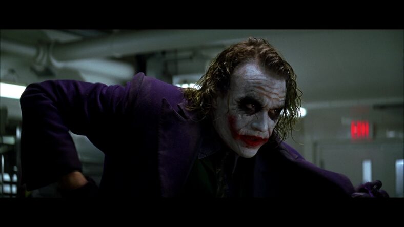 Joker (Heath Ledger) doesn't want to blow things out of proportion in The Dark Knight (2008), Warner Bros. Pictures