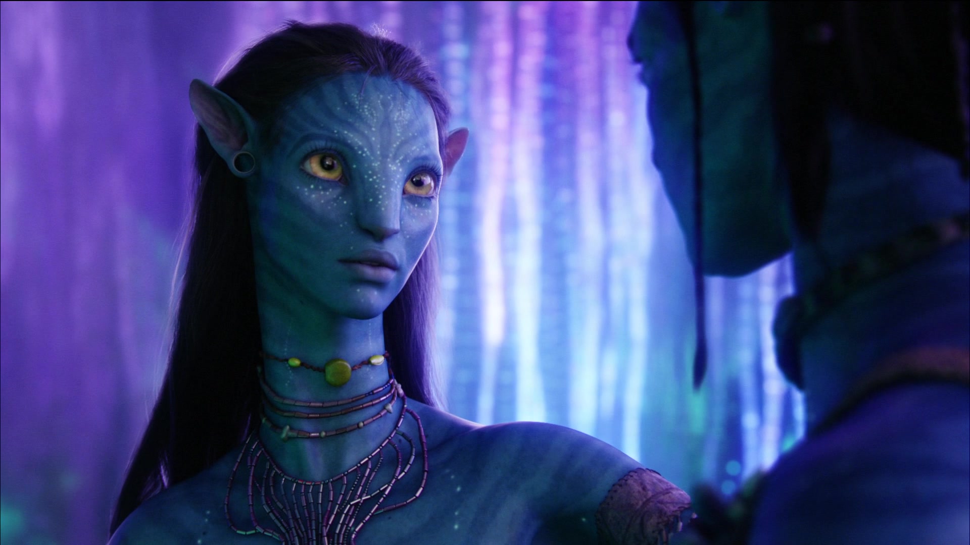 Neytiri (Zoe Saldaña) shows Jake Sully (Sam Worthington) the beauties of Pandora in Avatar (2009), 20th Century Studios 