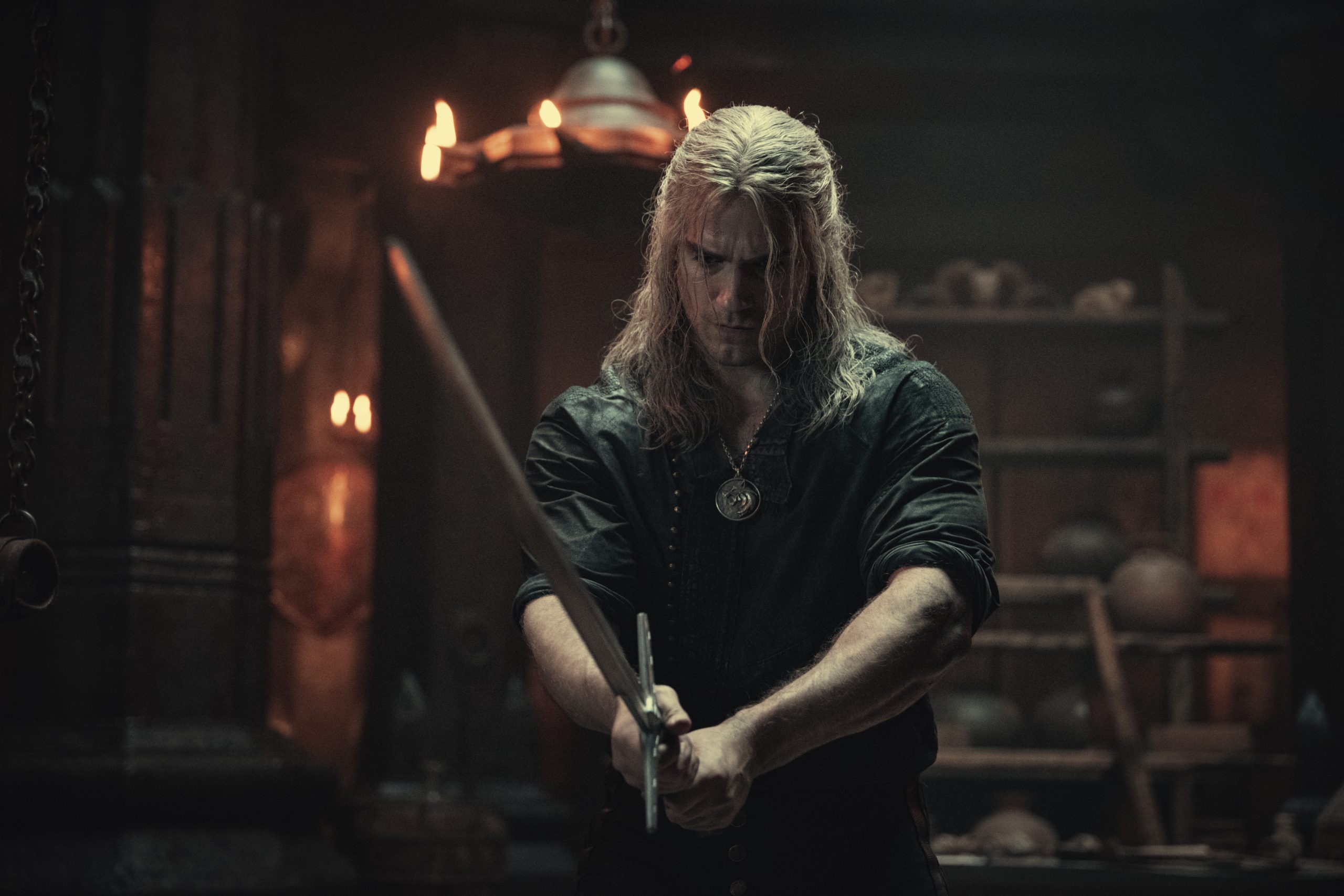 Geralt (Henry Cavill) takes up his blade in The Witcher Season 2 Episode 5 “Turn Your Back” (2021) via Netflix