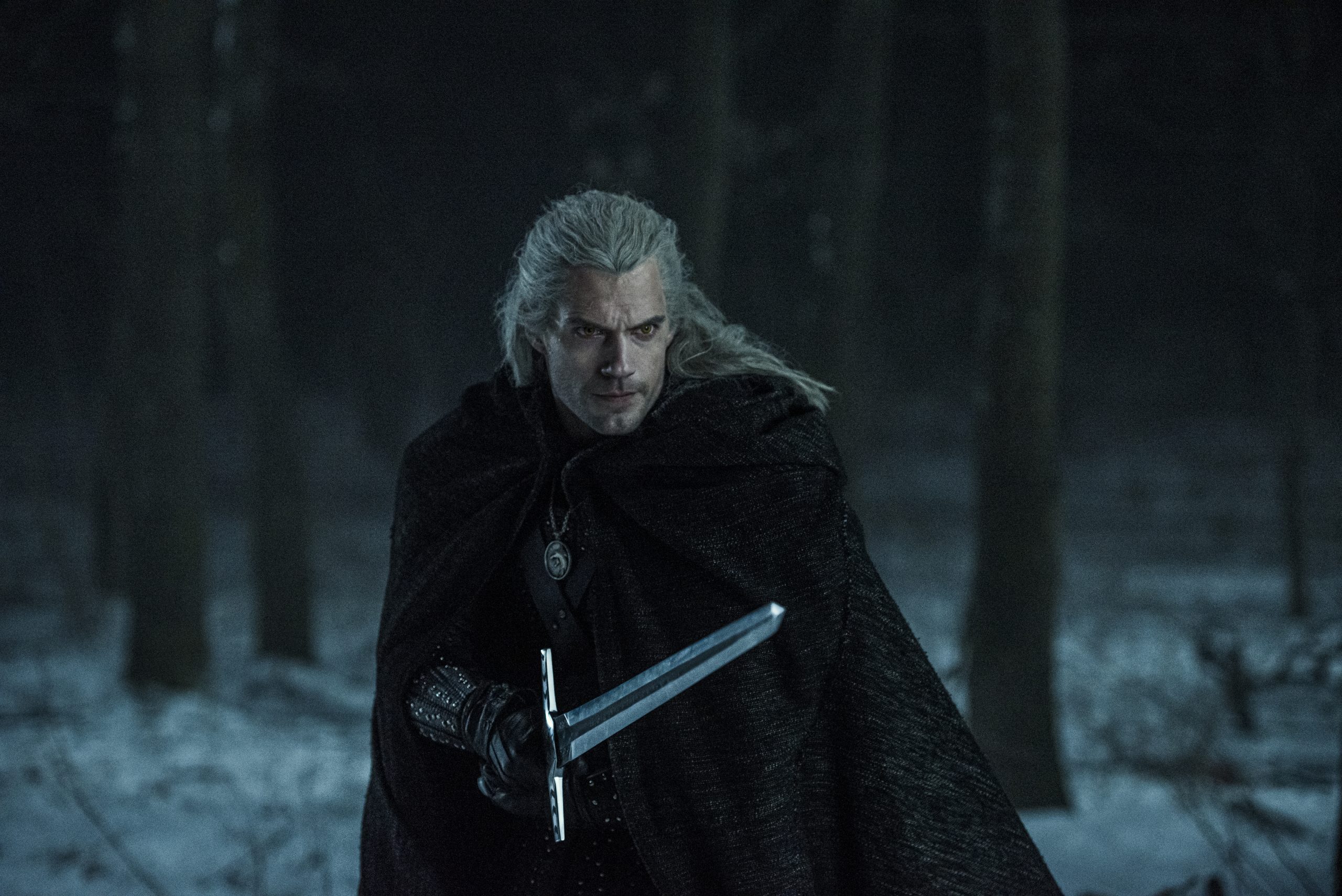 Geralt (Henry Cavill) draws his steel sword in The Witcher Season 1 Episode 4 “Of Banquets, Bastards, and Burials” (2019), Netflix