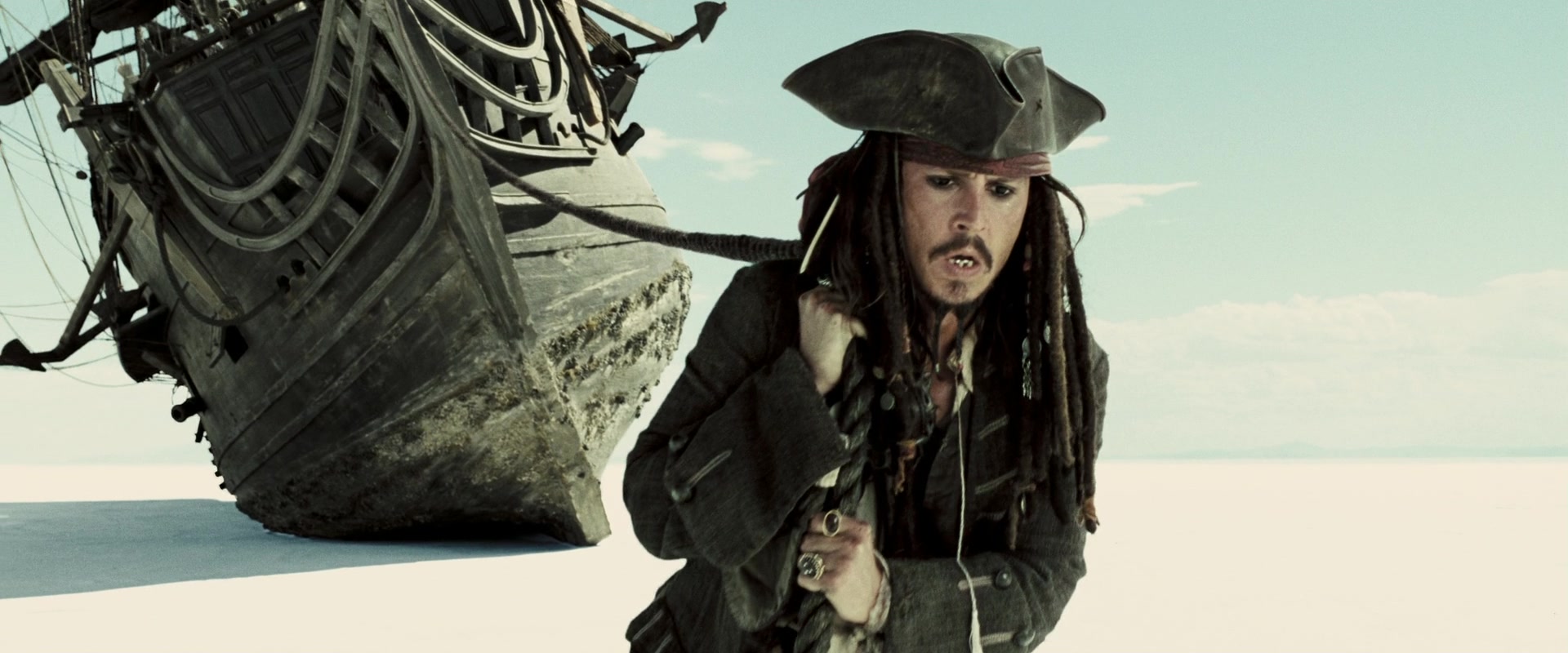 Captain Jack Sparrow (Johnny Depp) pulls the Black Pearl across Davy Jones' Locker in Pirates of the Caribbean: At World's End (2007) via Blu-ray