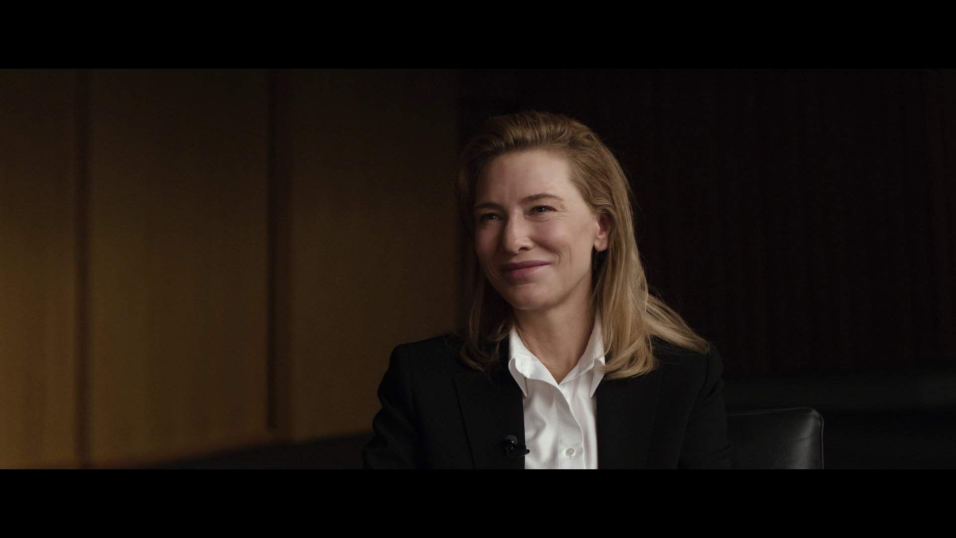 Lydia Tár (Cate Blanchett) concludes her interview with Adam Gopnik (himself) at The New Yorker Festival via Tár (2022), Universal Pictures