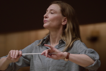 Lydia Tár (Cate Blanchett) readies herself to conduct via Tár (2022), Universal Pictures