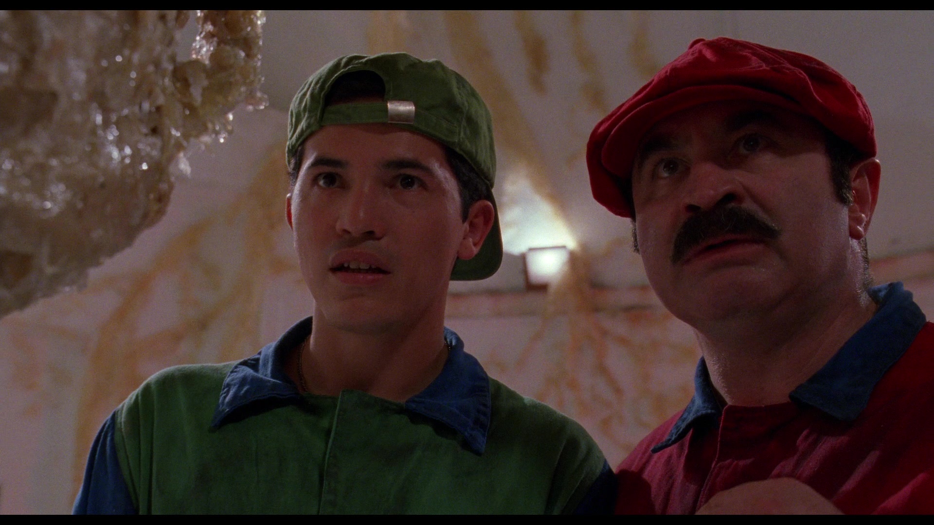 Mario (Bob Hoskins) and Luigi (John Leguizamo) infiltrate Dinohattan in Super Mario Bros. (1993), Walt Disney Studios via Blu-ray