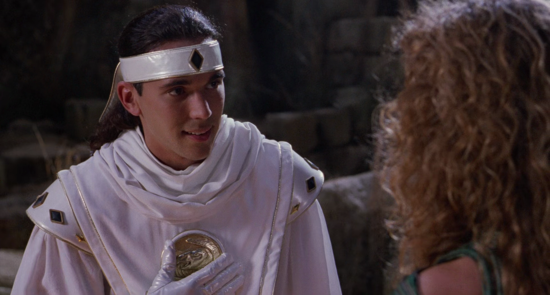 Tommy (Jason David Frank) learns of his connection to the Falcon Ninjetti from Dulcea (Gabrielle Fitzpatrick) in Mighty Morphin Power Rangers: The Movie (1995), Saban Entertainment