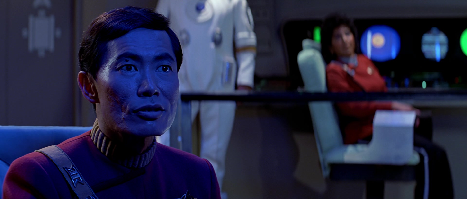 Sulu (George Takei) looks on as the Enterprise receives a transmission from Admiral Morrow (Robert Hooks) in Star Trek III: The Search for Spock (1984), Paramount Pictures via Blu-ray