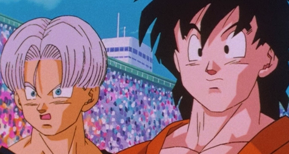 Goten (Masako Nozawa) and Trunks (Takeshi Kusao) are shocked to see Goku (Masako Nozawa) alive and well at the World Tournament in Dragon Ball Z Episode 291 "Goku's Next Journey" (1996), Toei Animation via Blu-ray