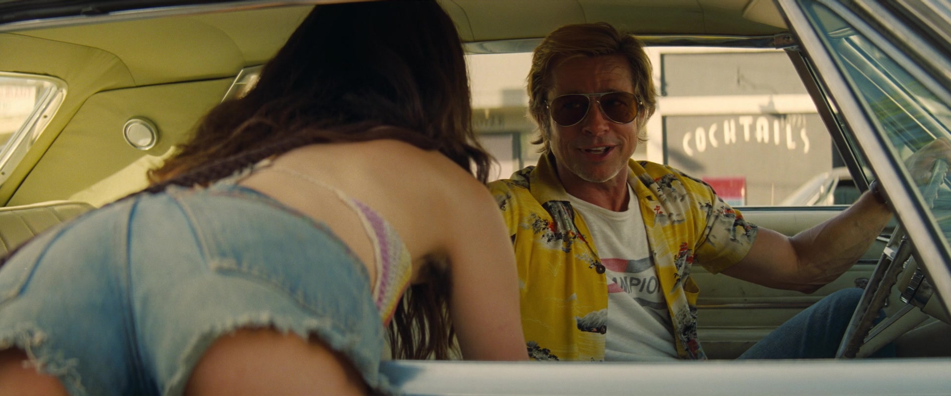 'Pussycat' (Margaret Qualley) asks Cliff Booth (Brad Pitt) for a ride in Once Upon A Time In Hollywood (2019), Sony Pictures via Blu-ray