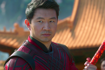 Shang-Chi (Simu Liu) stands ready to defend Tao Lo from the Ten Rings in Shang-Chi and the Legend of the Ten Rings (2021), Marvel Entertainment via Blu-ray