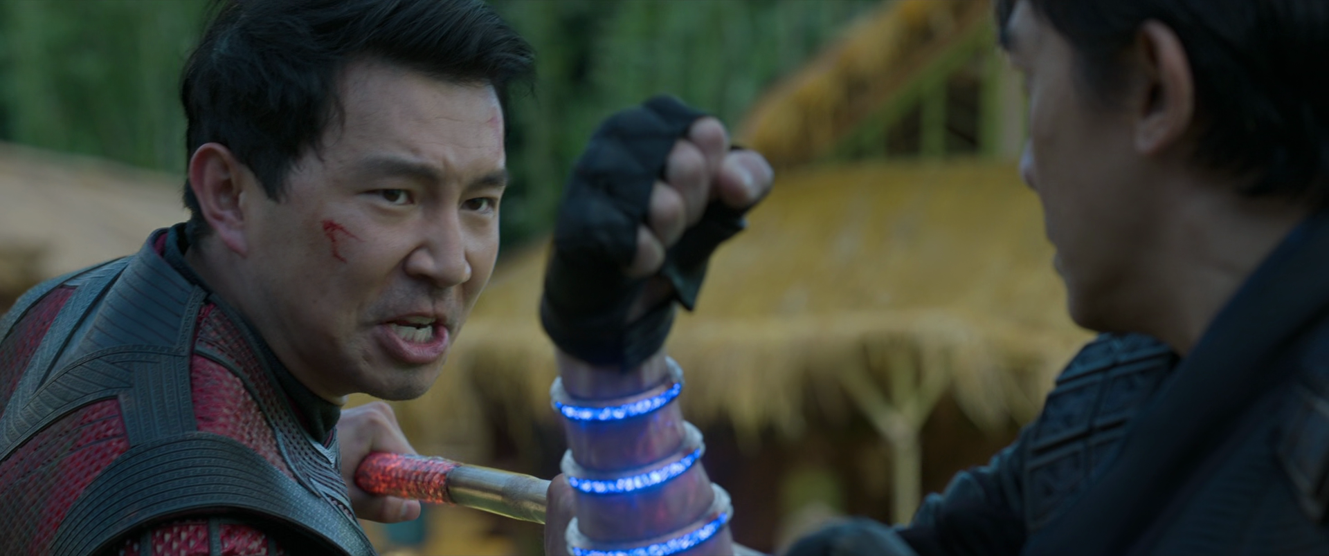 Shang-Chi (Simu Liu) clashes with Wenwu (Tony Leung) in defense of Tao Lo in Shang-Chi and the Legend of the Ten Rings (2021), Marvel Entertainment via Blu-ray