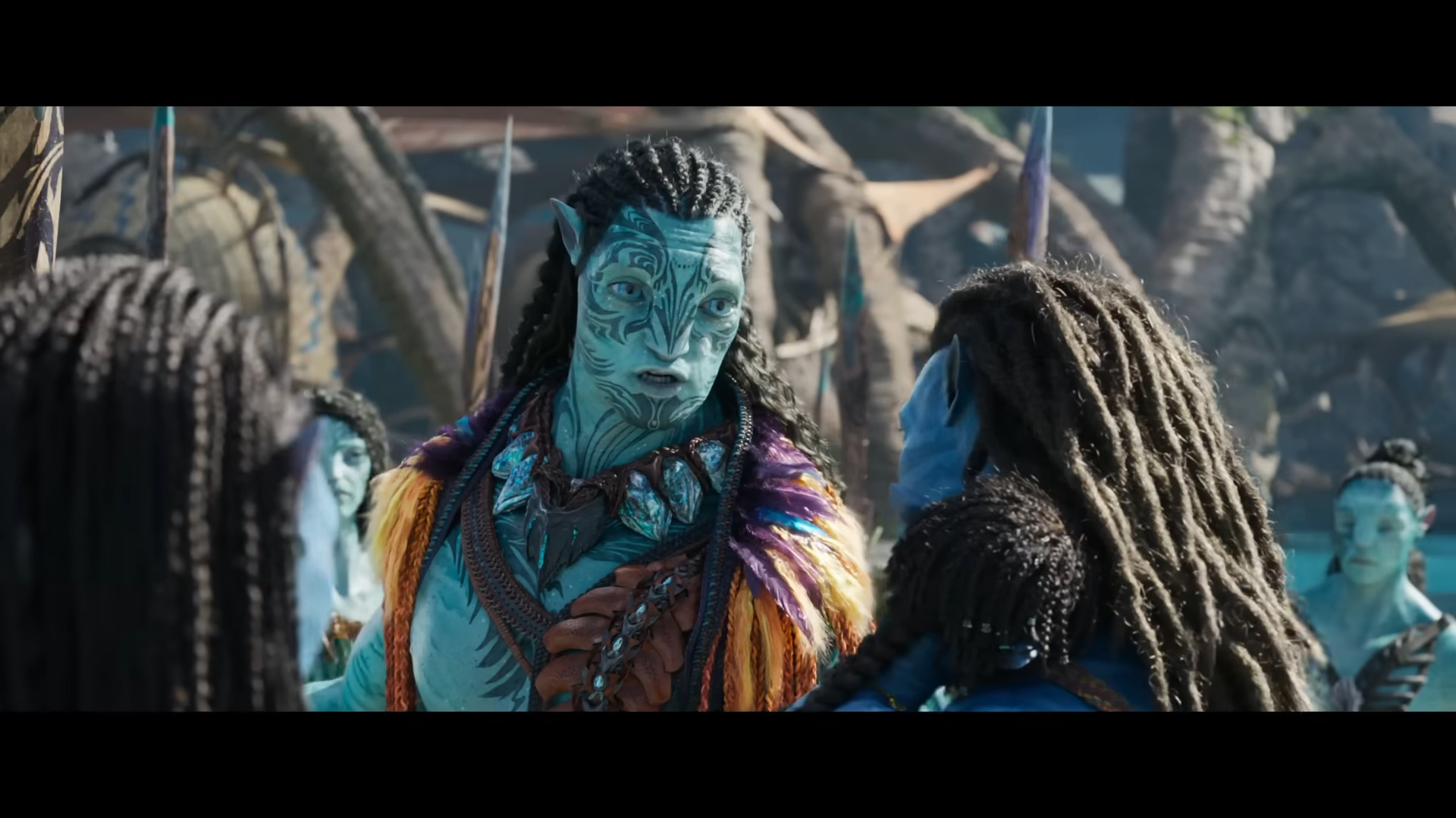 Tonowari (Cliff Curtis) greets Jake Sully (Sam Worthington) in Avatar: The Way of Water (2022), Disney via YouTube
