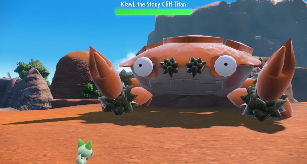 A giant Klaf, the Stony Cliff Titan, faces off against Sprigatito via Pokémon Scarlet & Violet (2022), Nintendo