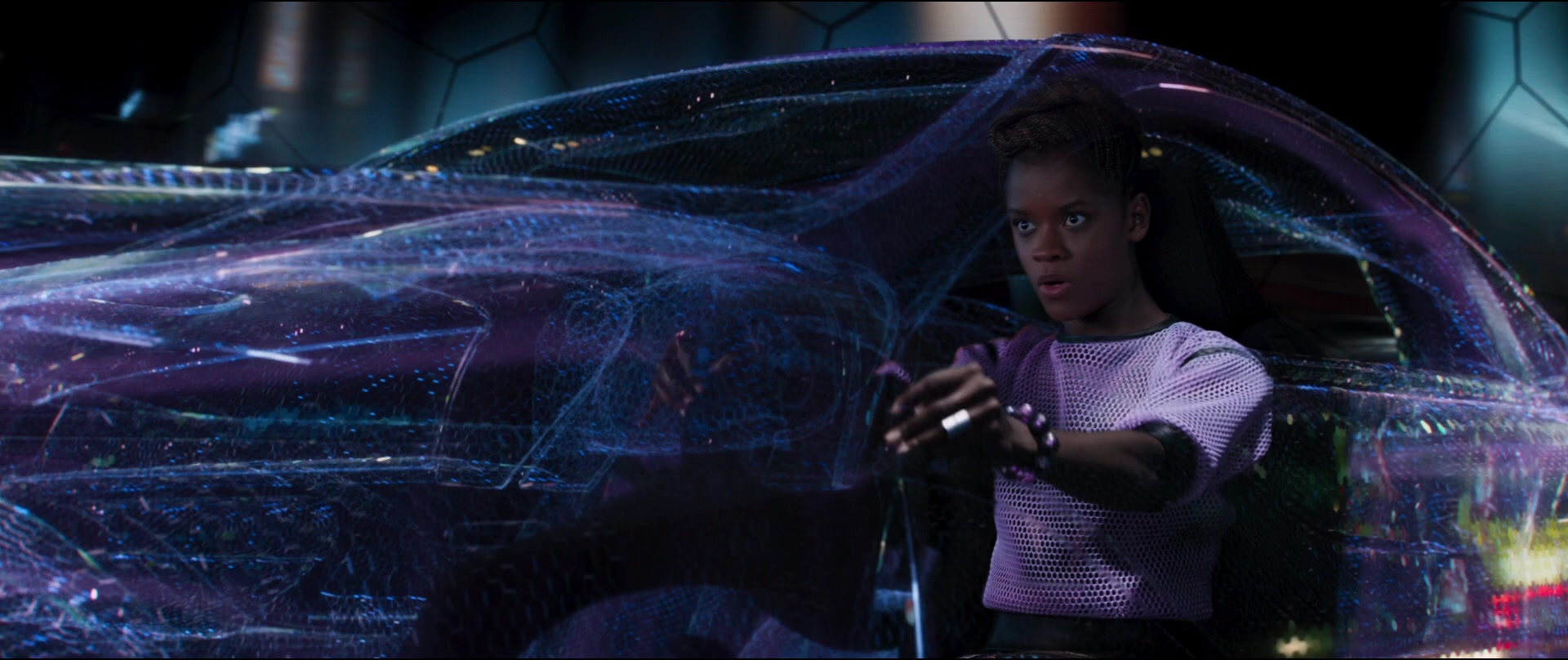 Shuri (Letitia Wright) utilizes the Remote Driving System to take control of a Lexus LS 500 F SPORT in Black Panther (2018), Marvel Entertainment via Blu-ray