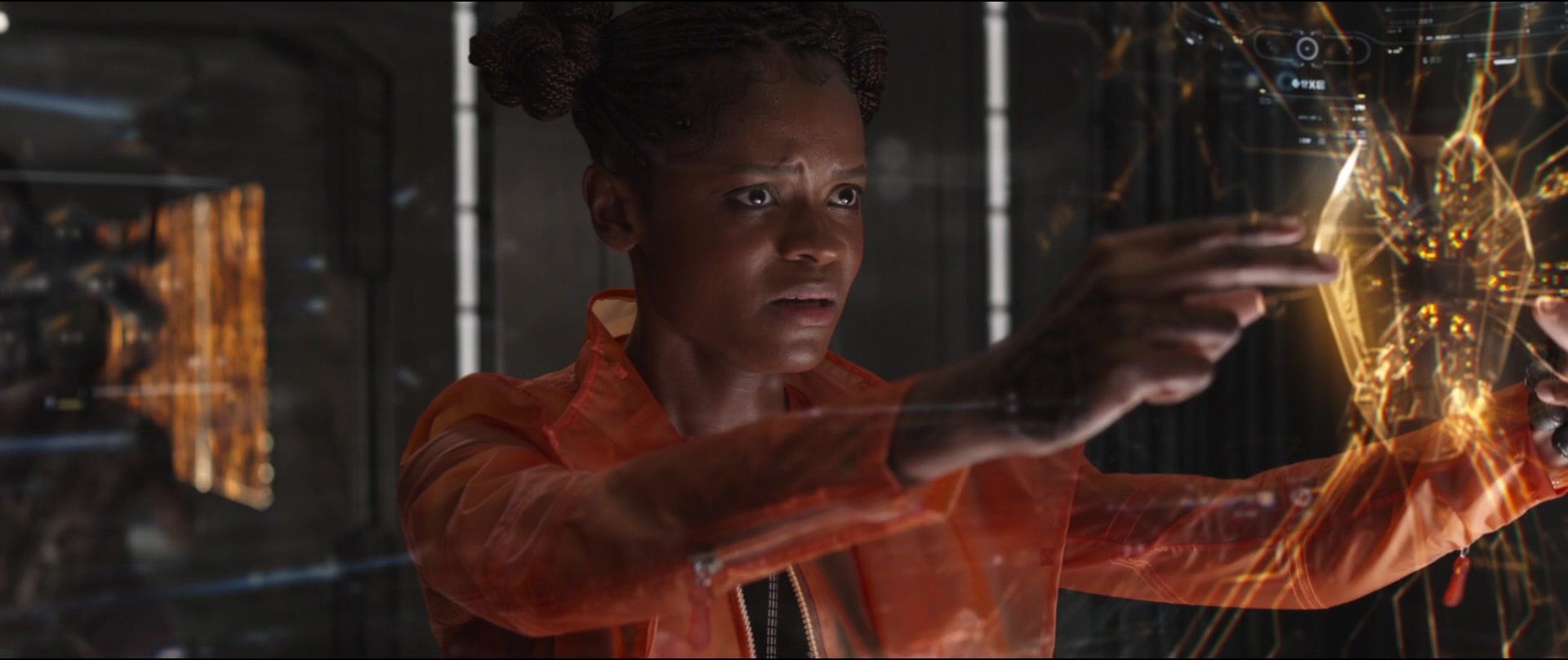 Shuri (Letitia Wright) attempts to surgically remove the Mind Stone from Vision's (Paul Bettany) forehead in Avengers: Infinity War (2018), Marvel Entertainment via Blu-ray